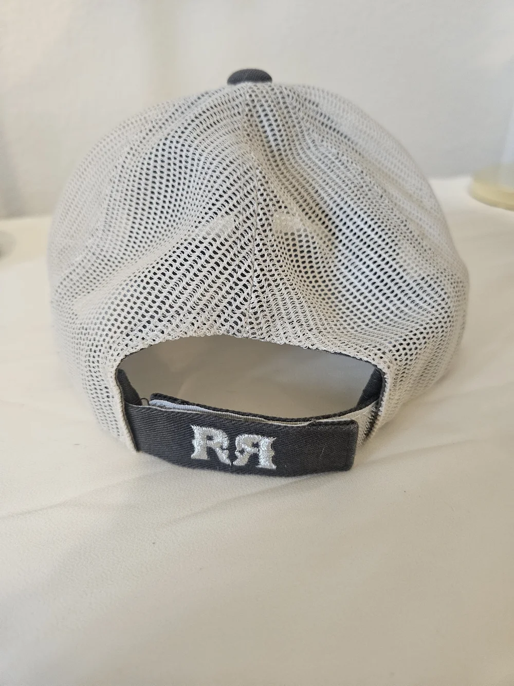 Buckle Brown Distressed Mesh Trucker Hat with White Embroidered Logo
